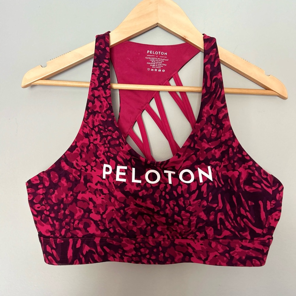 Peloton Women's Vibrant red animal Sports Bra. Fits D cups. Cutout back